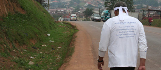 Daniel walking from Kampala to Entebbe